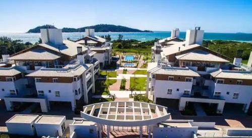 Campeche Leste Apartamento | Apartamento pé na areia em frente a Ilha do Campeche