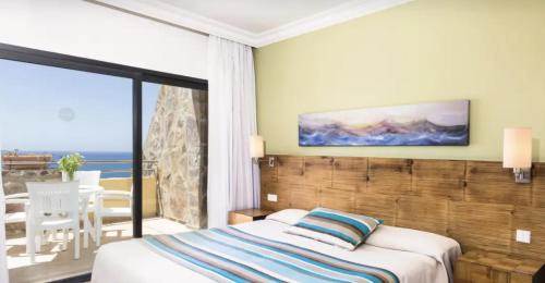Tarajalillo Apartamento | Apartamento superior con balcon amplio y sala de estar Bahia Feliz