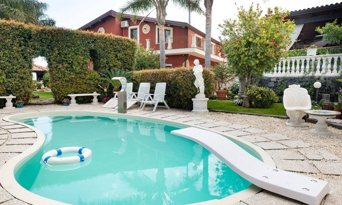 Santa Venera-Portosalvo Apartamento | Apartamento "Ai confini dell Etna 2" con piscina compartida, magníficas vistas y Wi-Fi