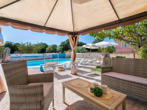 Trinita d'Agultu Apartamento | Apartment L'Oasi Trilo A6 by Interhome
