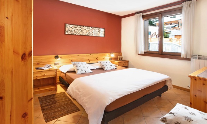Santa Caterina Valfurva Apartamento | Apartamento 'Chalet Primula 7' con vistas a la montaña, jardín compartido y Wi-Fi