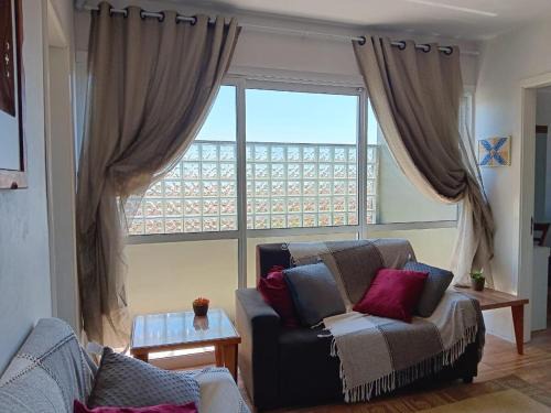 Passo de Torres Apartamento | Apartment 2 blocks from the sea with parking and Wi-Fi