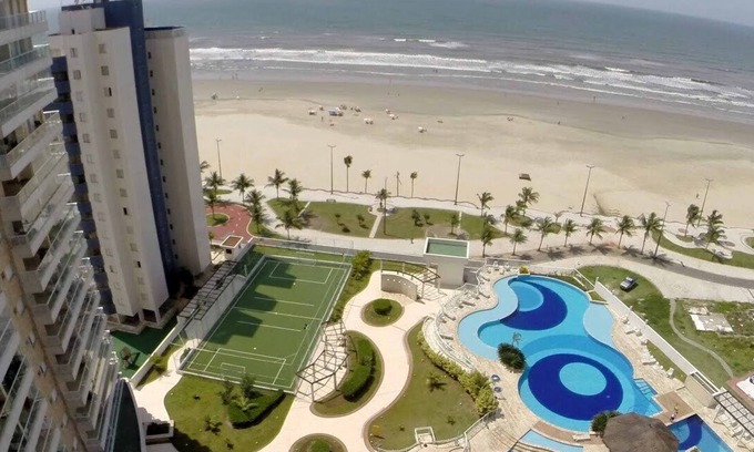 Mirim Apartamento | APARTAMENTO 3 DORMS - VILA MIRIM - GRANDE BEACH - PIE EN LA ARENA