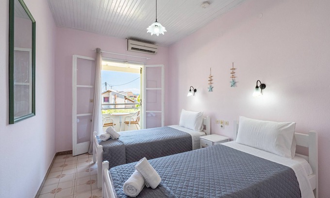 Roda Apartamento | Apartamento 'Alexandros Studios 10' con piscina compartida, Wi-Fi y aire acondicionado