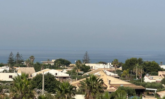 Marsala Apartamento | Apartamento 'Ammare' con piscina compartida, Wi-Fi y aire acondicionado