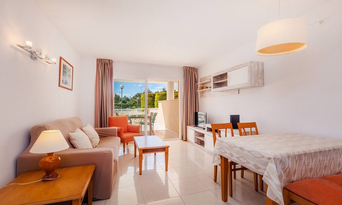 Cala Bona Apartamento | Apartamento 'Apartamento Espiga' con piscina compartida, Wi-Fi y aire acondicionado