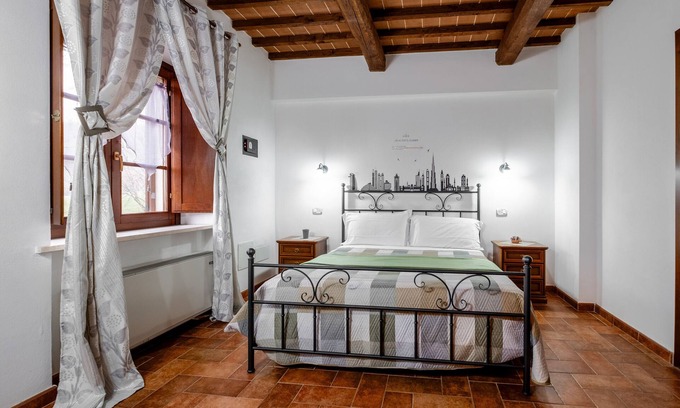 Catabbio Apartamento | Apartamento 'Appartamento Silver' con piscina compartida y jardín compartido