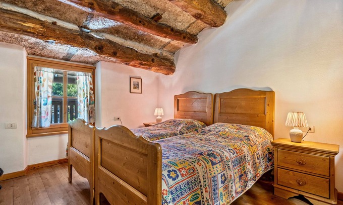 Ala Apartamento | Apartamento 'Appartamento Del Vecchio Fienile' con vistas a las montañas y jardín compartido