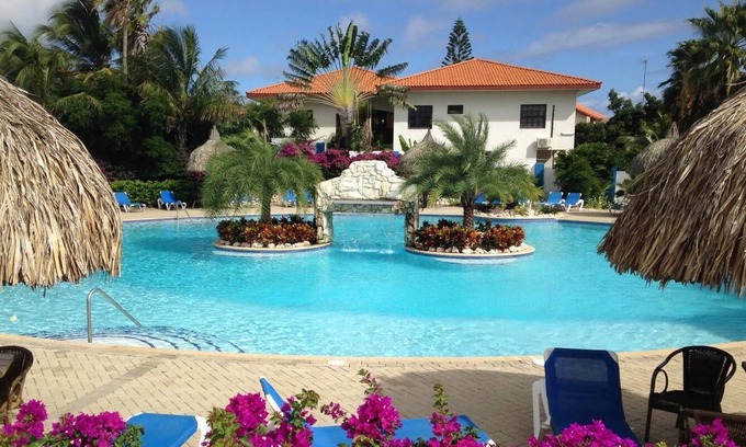 Willemstad Apartamento | Apartamento BonBininaCuracao Gran piscina en un resort tropical vigilado