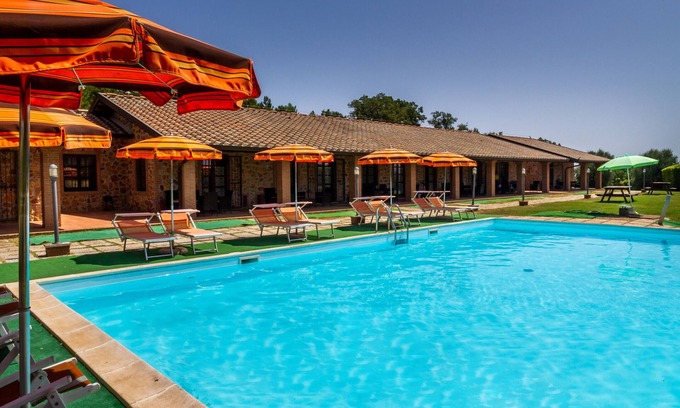 La Pesta Apartamento | Apartamento Casa Vacanza Il Carpignone 6 con vistas al lago, piscina compartida y jardín