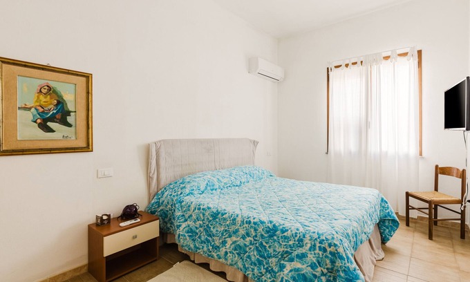 Solanas Apartamento | Apartamento 'Casa Rimedia' con balcón, Wi-Fi y aire acondicionado