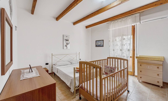 Gonnesa Apartamento | Apartamento 'Casa Rustica' con terraza privada, Wi-Fi y aire acondicionado