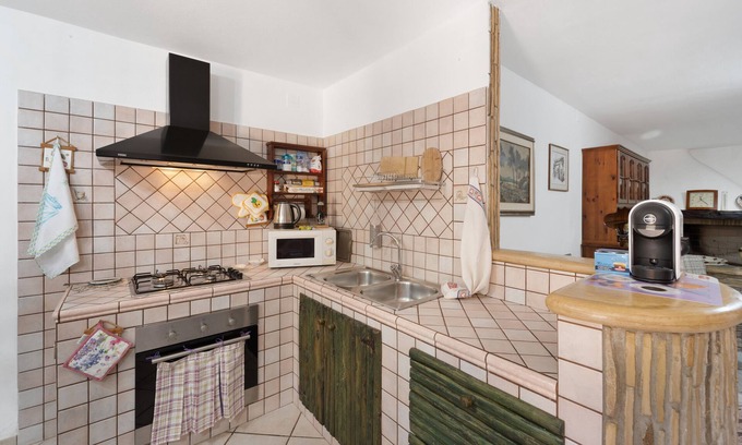 Iglesias Apartamento | Apartamento 'Casa S'arriali' con vistas a la montaña, Wi-Fi y aire acondicionado