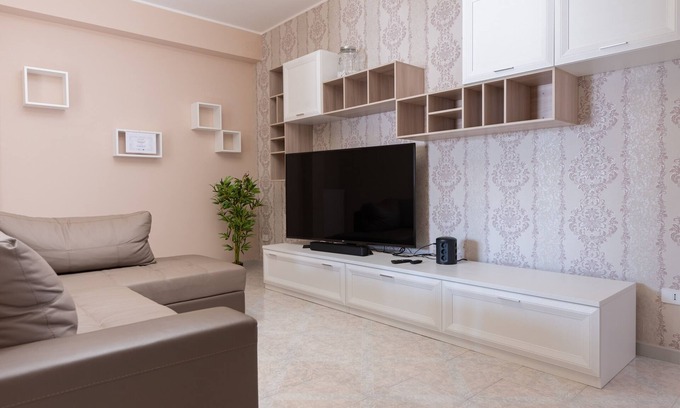 Pulsano Apartamento | Apartamento 'Casa Vacanze Francesco' con balcón, Wi-Fi y aire acondicionado