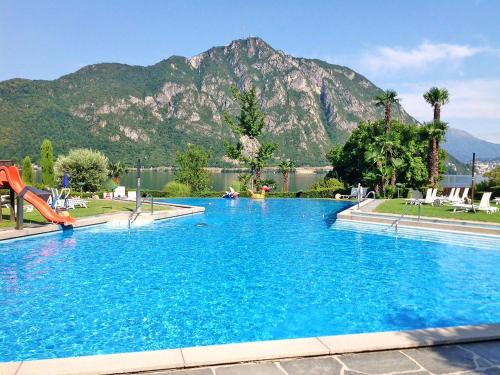Bissone Apartamento | Apartment Charming Gardenview App- 105 by Interhome