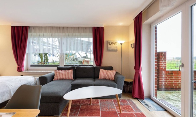 Hedwigenkoog Apartamento | Apartamento 'Deichblick 3' con jardín y balcón compartidos