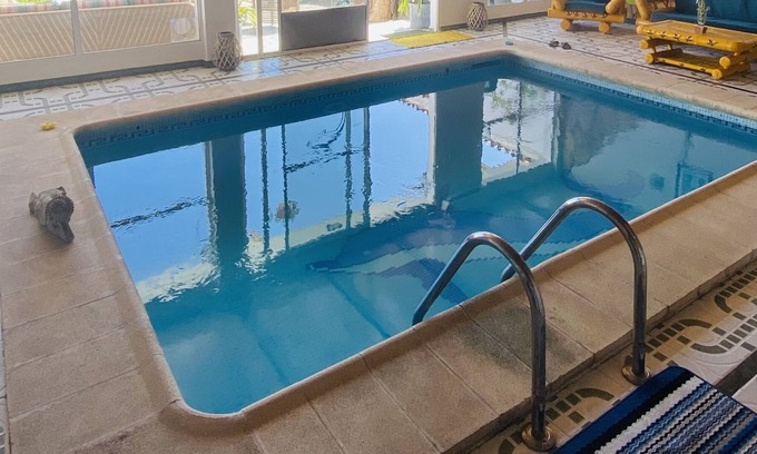 Arucas Apartamento | Apartamento Delfin Azul con piscina privada y climatizada(Bajo techo de madera)