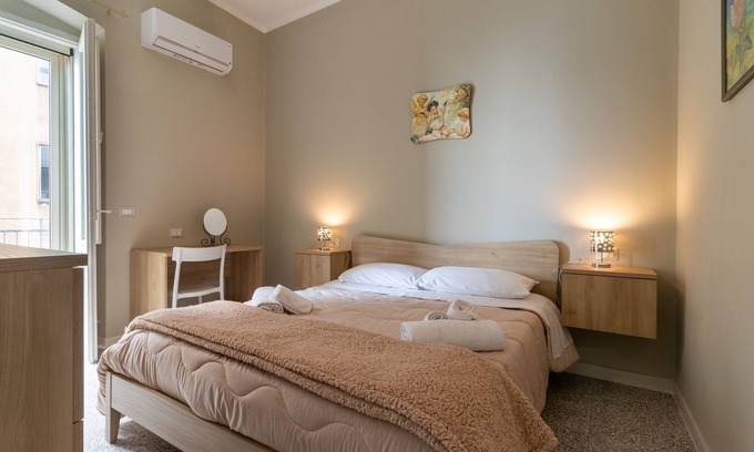 Mottola Apartamento | Apartamento 'Dormiamoci Sù' con balcón, Wi-Fi y aire acondicionado