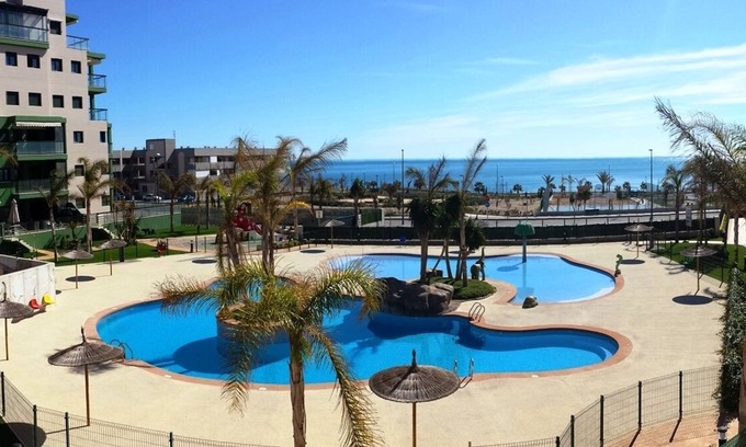 Torre de la Horadada Apartamento | Apartamento en 1ª línea del mar con piscinas comunitarias