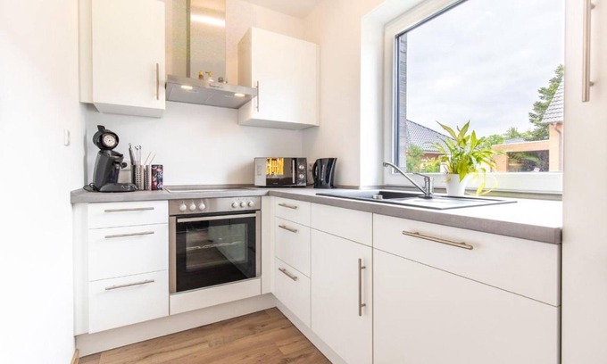 Leer Apartamento | Apartment 'Ferienhaus Siedlerstraße' with Private Terrace, Private Garden and Wi-Fi