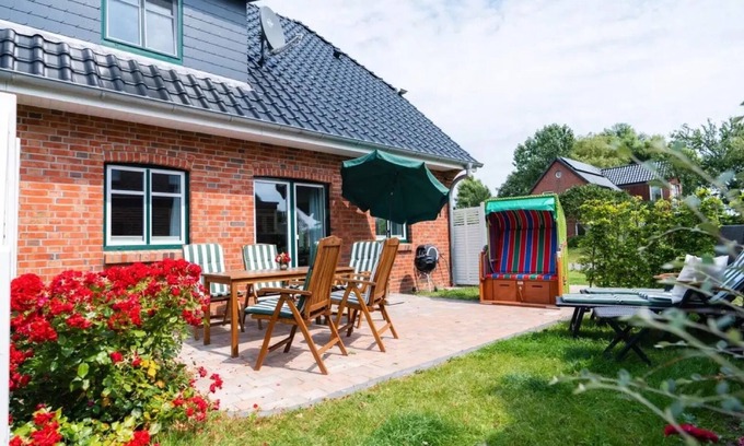 Pellworm Apartamento | Apartamento 'Ferienhaushälfte Hafenperle' con jardín compartido y Wi-Fi