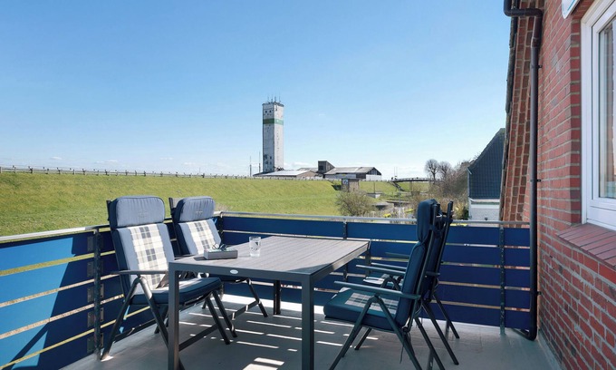 Suederhafen Apartamento | Apartamento 'Ferienwohnung Deichblick' con jardín compartido, balcón y Wi-Fi