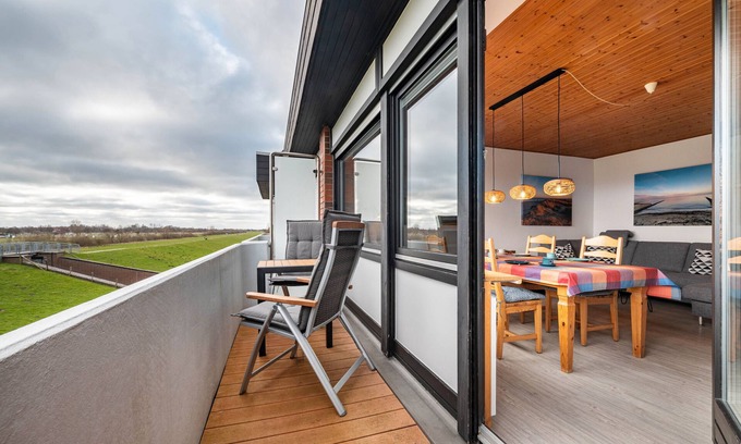 Schillig Apartamento | Apartamento 'Ferienwohnung 25 Strandkorb, 50 Qm' con vistas al mar, balcón y Wi-Fi