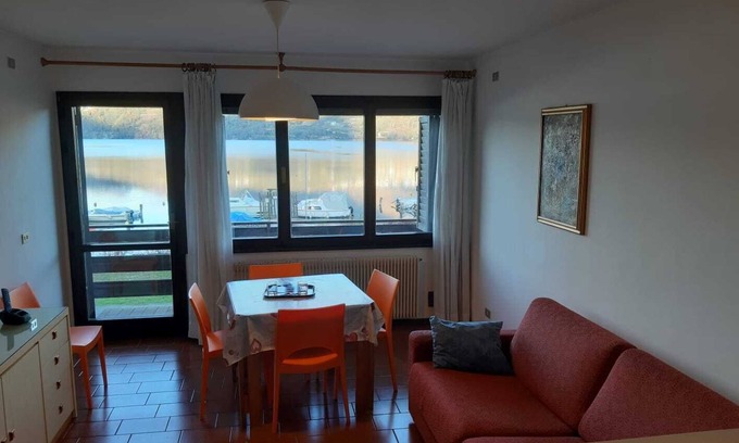 Calceranica al Lago Apartamento | Apartamento 'Garden Alle Barche - Cinzia 5' con vistas al lago, jardín compartido y Wi-Fi