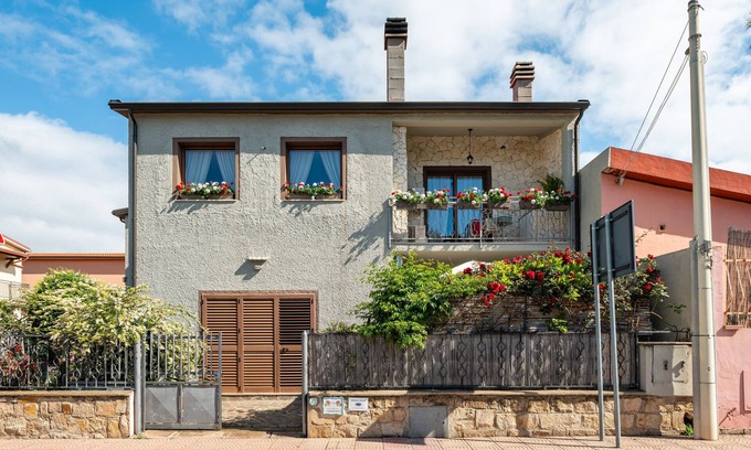 Villa San Pietro Apartamento | Apartamento 'Gerani Rossi' con jardín compartido, Wi-Fi y aire acondicionado