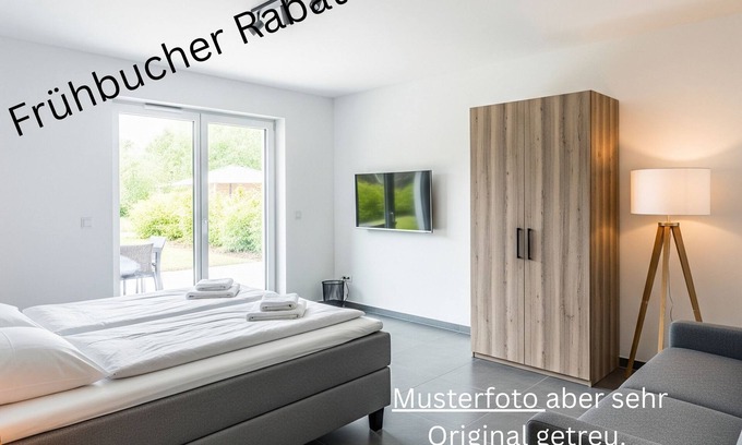 Niederemmel Apartamento | Apartment - ground floor apartment, 70 qm², new kitchen, terrace, parking lot, modern, up to 4 pers