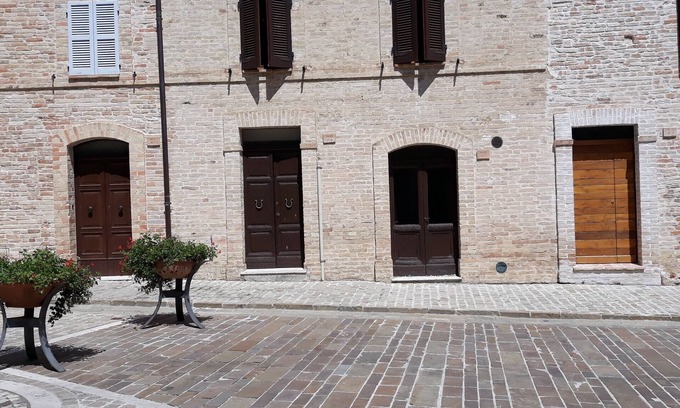 Moresco Apartamento | apartamento en un antiguo edificio medieval en la plaza central de Moresco