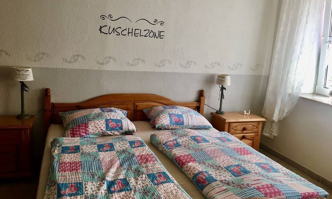 Brauneberg Condominio | Apartment in Brauneberg with 2 bedrooms, large slate living room, green courtyard, Moselle