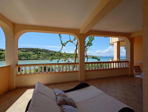 Rab Town Apartamento | Apartment in Kampor with sea view, balcony, air conditioning, WiFi (4838-1)
