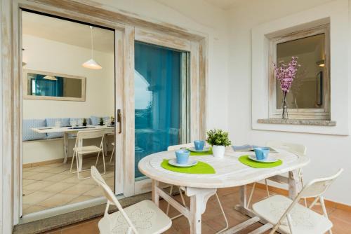 Baia Caddinas Apartamento | Apartment in S'Abba e Sa Pedra complex with pool