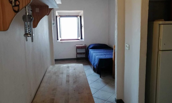 Isola del Giglio Apartamento | Apartment in the intimate Castello village with sunset sea view