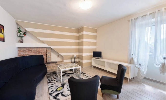 Lonato del Garda Apartamento | Apartamento 'La Corte Delle Fate' con Piscina Compartida, Jardín Compartido y Wi-Fi