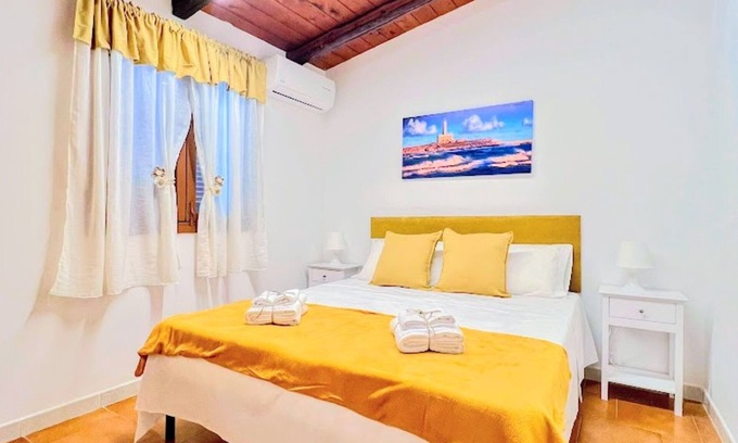 Montincello Apartamento | Apartamento 'La Mignola - Bilo 2 - Duplicado' con Jardín Compartido, Wi-Fi y Aire Acondicionado