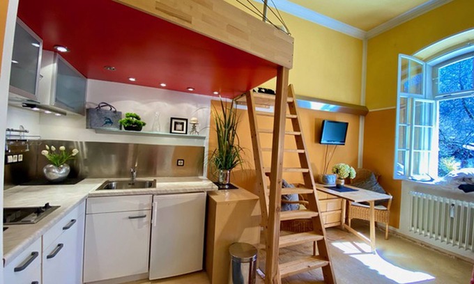 Hohenaschau im Chiemgau Apartamento | Apartment living room and bedroom with bunk bed, 20 sqm, App. 102