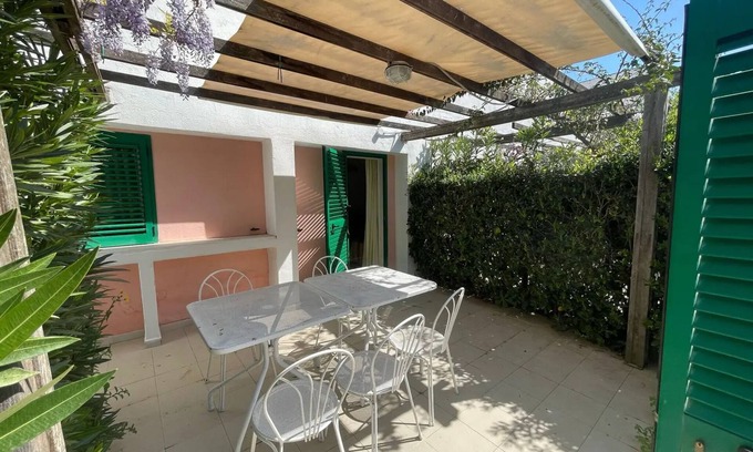 Peschici Apartamento | Apartamento 'Maritalia 8' con terraza privada, jardín privado y aire acondicionado