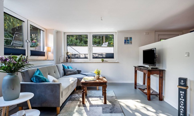 Brodten Apartamento | Apartamento 'Meerlust' con terraza privada, jardín privado y Wi-Fi