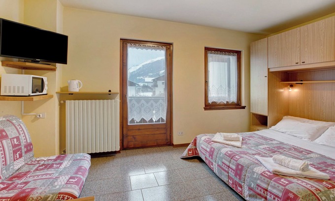 Valdisotto Apartamento | Apartamento "Monolocale Iris 1" con vistas a la montaña, balcón y Wi-Fi