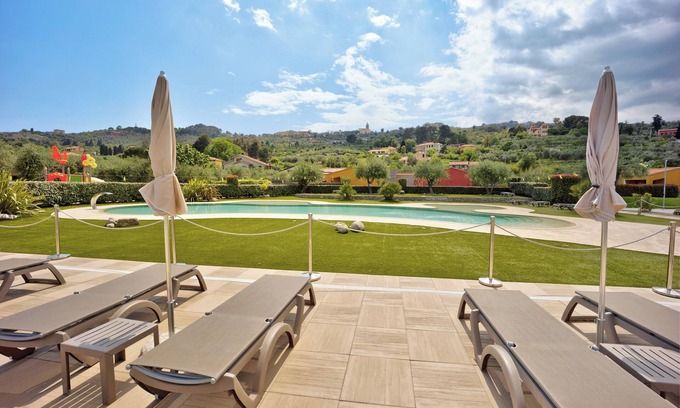 Poggi Apartamento | "Appartamento Monolocale Rebi" con piscina compartida, jardín y Wi-Fi