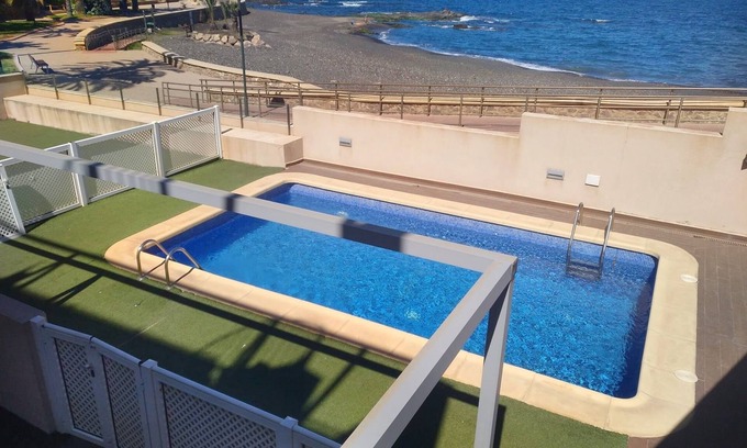 Villaricos Apartamento | Apartamento en primera línea de Mar con piscina, aire acondicionado /calefacción