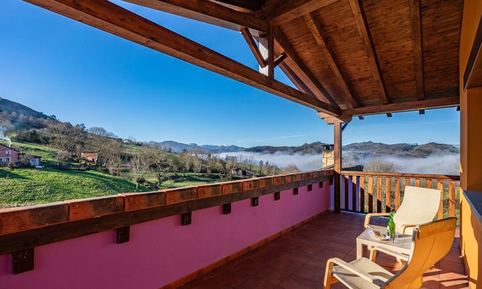 Santianes de Ola Apartamento | Apartamento 'Picos' con vistas a la montaña, jardín compartido y Wi-Fi