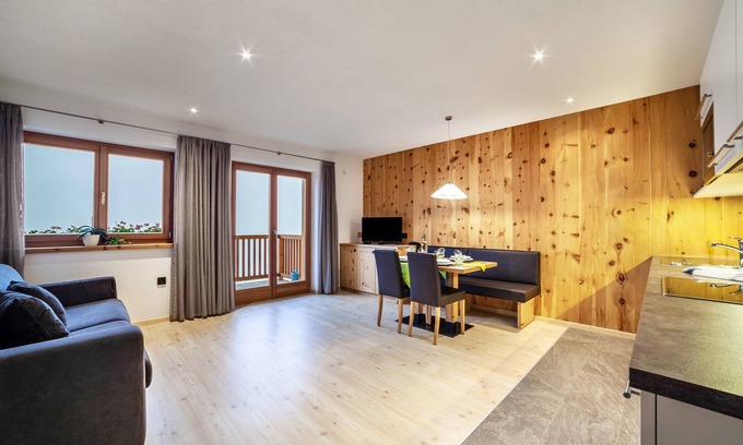 Ultimo Apartamento | Apartamento "Residence Kalchgruberhof - Lärche" con vistas a la montaña, jardín compartido y Wi-Fi