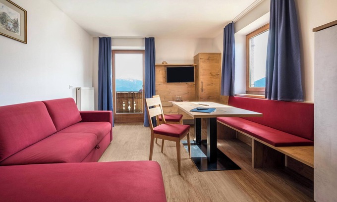 Maranza Apartamento | Apartamento "Residence Condor Rosengarten" con vistas a la montaña, sauna, Wi-Fi y jardín