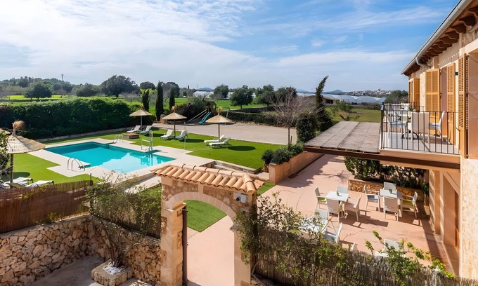 Ariany Apartamento | Apartamento 'S Hort Can Capità Familiar Terraza 4' cerca del mar con piscina compartida y Wi-Fi
