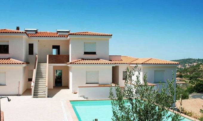 Badesi Apartamento | Apartment Suono del Blu in charming residence with the pool in Badesi