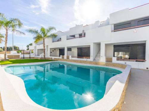 Santiago de la Ribera Apartamento | Apartment Tropical Beach Penthouse by Interhome