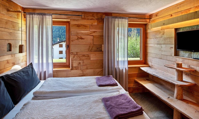 Pie Falcade Apartamento | Apartment 'Tana Del Picchio' with Mountain View, Shared Garden and Wi-Fi